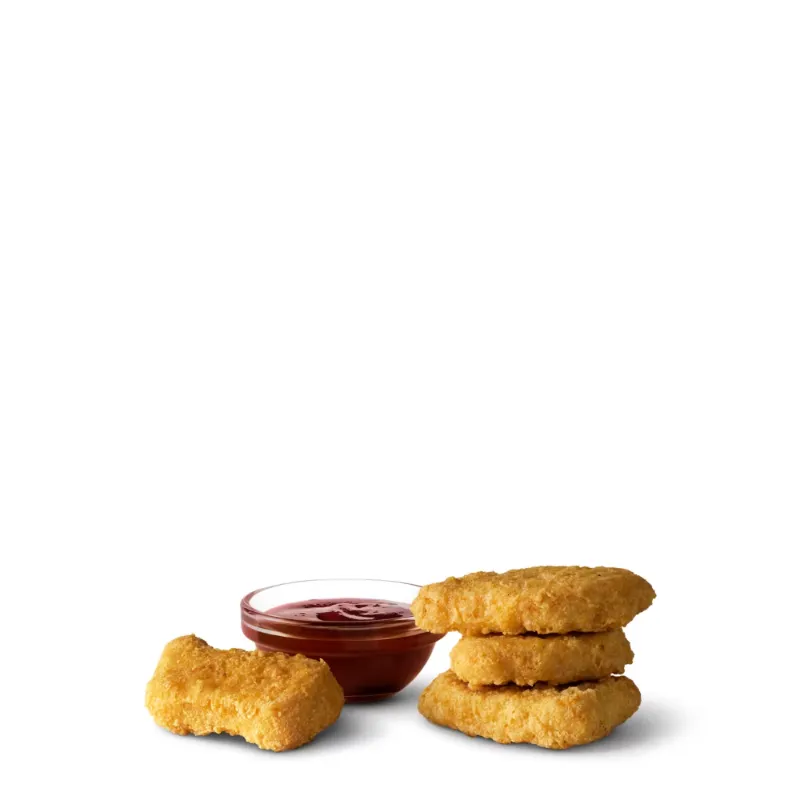 [vc_row height="small"][vc_column width="1/1"][vc_column_text] 4 Chicken McNuggets [/vc_column_text][vc_row_inner content_placement="middle"][vc_column_inner width="1/2"][us_image image="317" link="%7B%22url%22%3A%22%22%7D"][/vc_column_inner][vc_column_inner width="1/2"][vc_column_text] Craving something quick and tasty? McDonald's 4 Piece Chicken McNuggets are a perfect choice. Each nugget is made from tender, all-white meat chicken. They are coated in a light, crispy batter. Then they get cooked until golden brown. The result is a juicy inside with a crunchy outside. These nuggets are easy to eat on the go. They fit well as a snack or a side item. Kids and adults both enjoy their mild, comforting flavor. You can pair them with your favorite dipping sauce. Options like sweet and sour, barbecue, or honey mustard work great. This pack of 4 is ideal for a light bite. It also works well alongside fries or a salad. Simple, satisfying, and always fresh. That's the promise behind every order. McDonald's keeps quality consistent across every location. Each bite delivers the same great taste you expect. Try them today and enjoy a classic favorite. [/vc_column_text][/vc_column_inner][/vc_row_inner][/vc_column][/vc_row][vc_row height="small"][vc_column width="1/1"][vc_column_text] Nutritional Information [/vc_column_text][us_separator size="custom" height="20px"][vc_column_text] 170 Cal. Calories 9g Protein 10g Total Carbs (4% DV) 10g Total Fat (13% DV) Saturated Fat: 1.5g (8% DV) Trans Fat: 0g Cholesterol: 25mg (8% DV) Dietary Fiber: 0g (1% DV) Total Sugars: 0g Added Sugars: 0g (0% DV) Vitamin D: 0mcg (0% DV) Calcium: 6mg (0% DV) Iron: 0.5mg (2% DV) Potassium: 150mg (4% DV) Sodium: 340mg (15% DV) [/vc_column_text][/vc_column][/vc_row][vc_row height="small"][vc_column width="1/1"][vc_column_text] Ingredient Breakdown [/vc_column_text][us_separator size="custom" height="20px"][vc_column_text] COMPONENT MAIN INGREDIENTS ALLERGENS LISTED Chicken McNuggets White boneless chicken, water, vegetable oil, enriched flour, bleached wheat flour, yellow corn flour, vegetable starch, salt, leavening, spices, yeast extract, lemon juice solids, dextrose, natural flavors Wheat 4 Chicken McNuggets